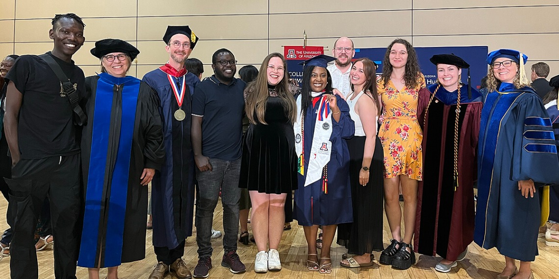 Faculty and students on graduation day