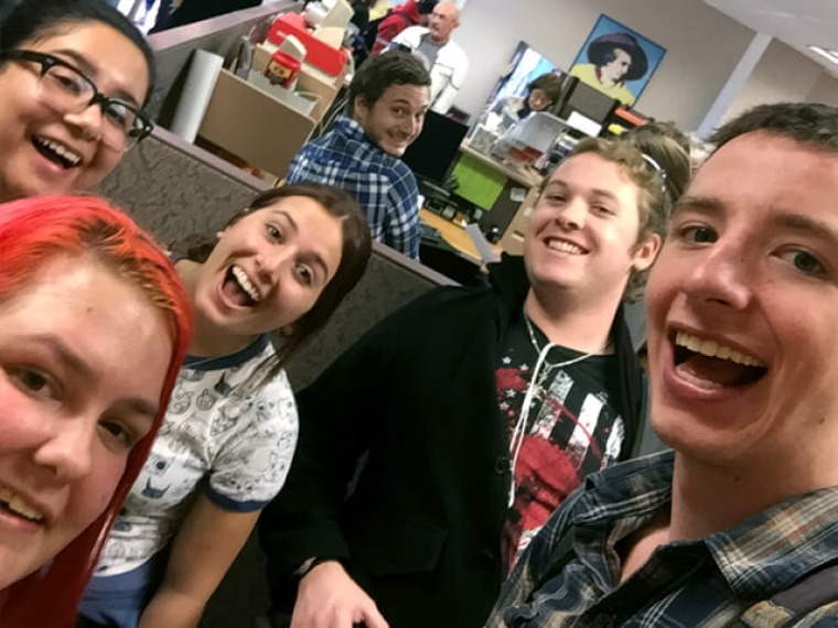 Group of students hamming it up in front of the camera
